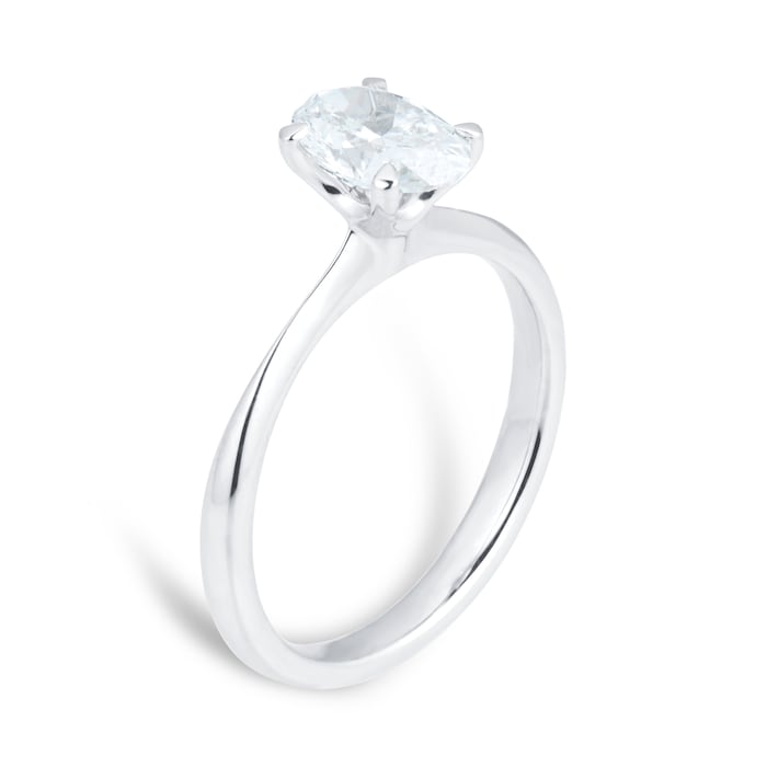 1 carat oval lab diamond solitaire ring in a 14kt white gold band. The ring is set in a classic 4 prong setting.