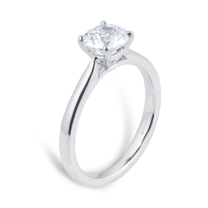 1 carat round lab-grown diamond solitaire ring in 14kt hallmark white gold band, featuring a classic four-prong setting; sustainable and luxurious engagement jewelry.