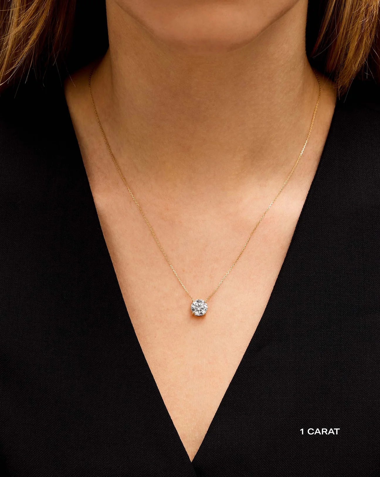1 ct round  lab diamond solitaire pendant in 14kt yellow gold necklace. The necklace is sustainable, ethical and embodiment of luxury jewellery for everyday and special occassions.