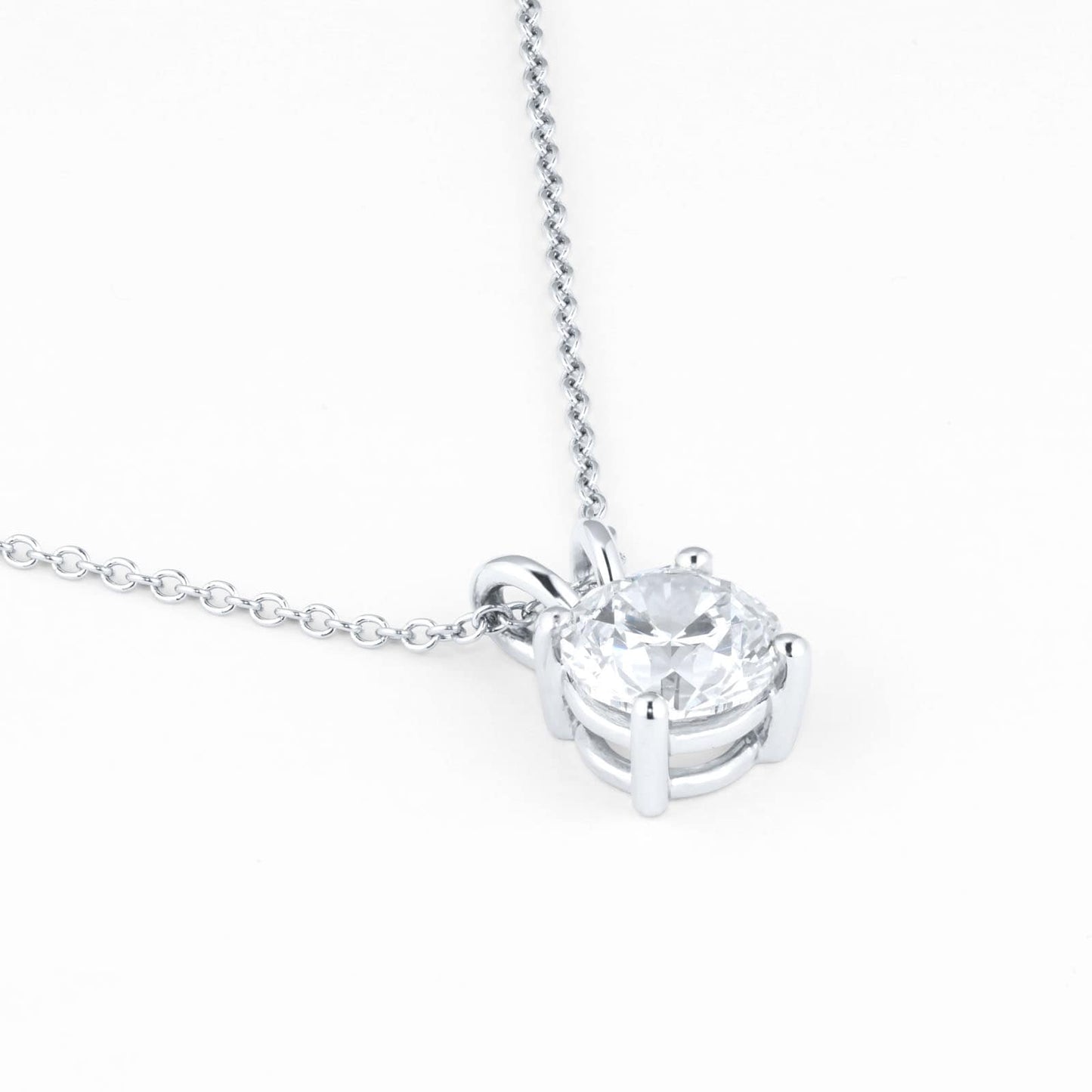 2 carat round shape lab diamond solitaire pendant in a 14kt white gold chain necklace