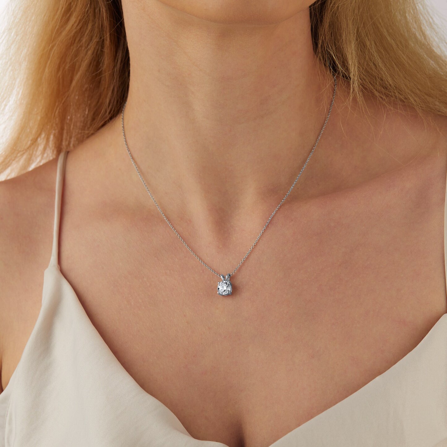 2 carat lab diamind solitaire pendant with a loop on a 14kt white gold chain necklace
