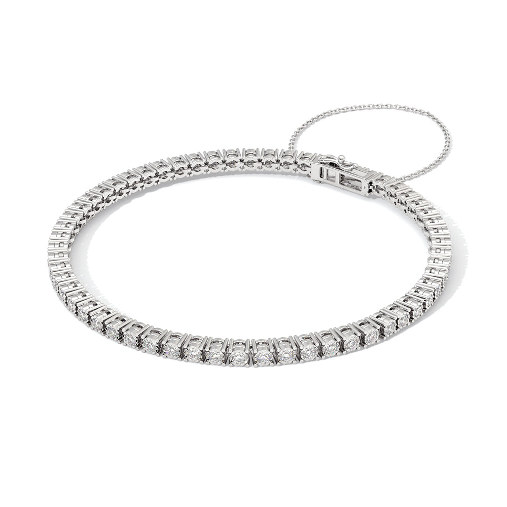 The image shows a 6.24 carat lab diamond tennis bracelet in 14kt hallmark white gold with it’s setting and clasp closure.