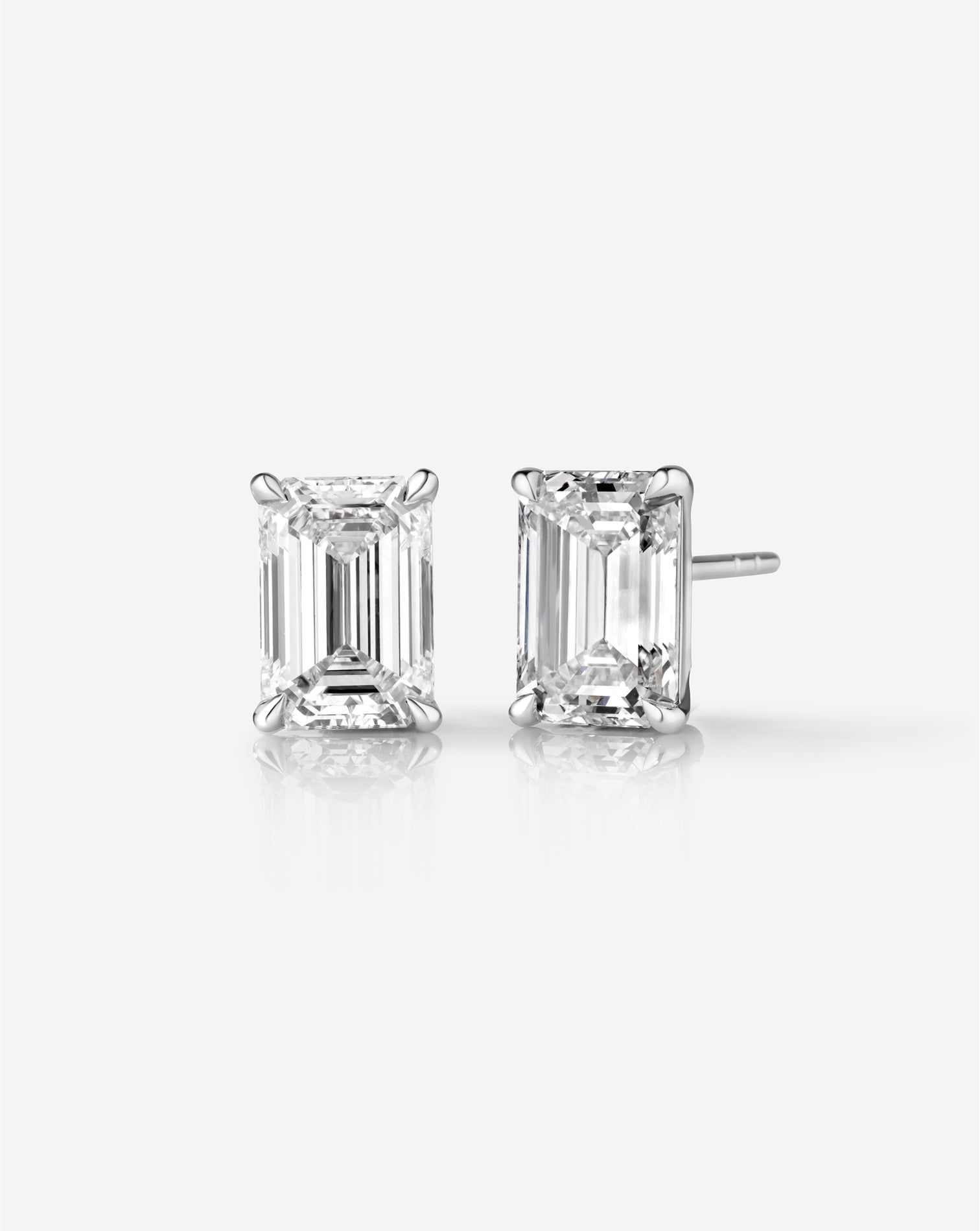 6ct Pair Emerald Cut Lab Grown Diamonds Stud Earrings  set in 14kt hallmark white gold