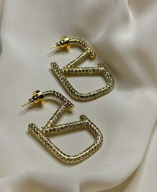 Crystal v logo hoop earrings made in 92.5 Sterling silver with 18kt gold plating