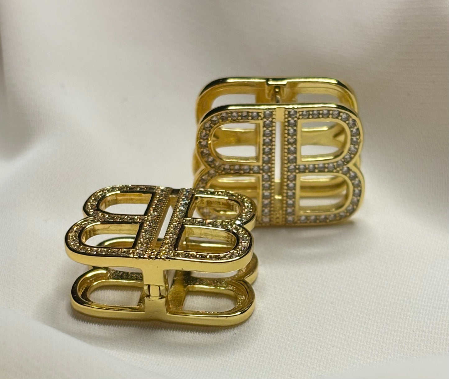 BB initial clip on earrings made in 92.5 sterling silver, and 18 karat gold plating
