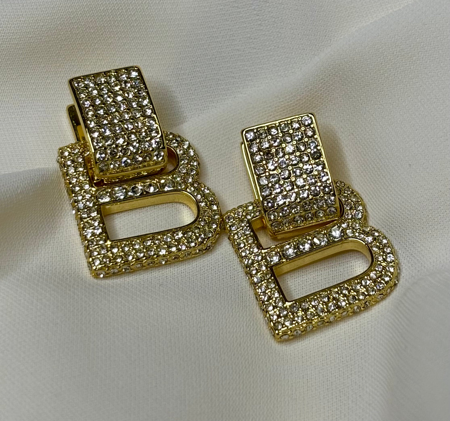 B initial clip on earrings made in 92.5 Sterling silver with 18kt gold plating and moissanite stones
