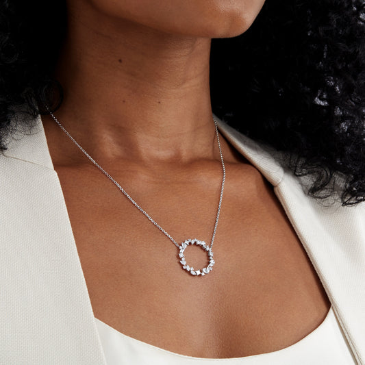 Mixed shape lab diamond pendant set in a circular pattern set in 14kt hallmark white gold