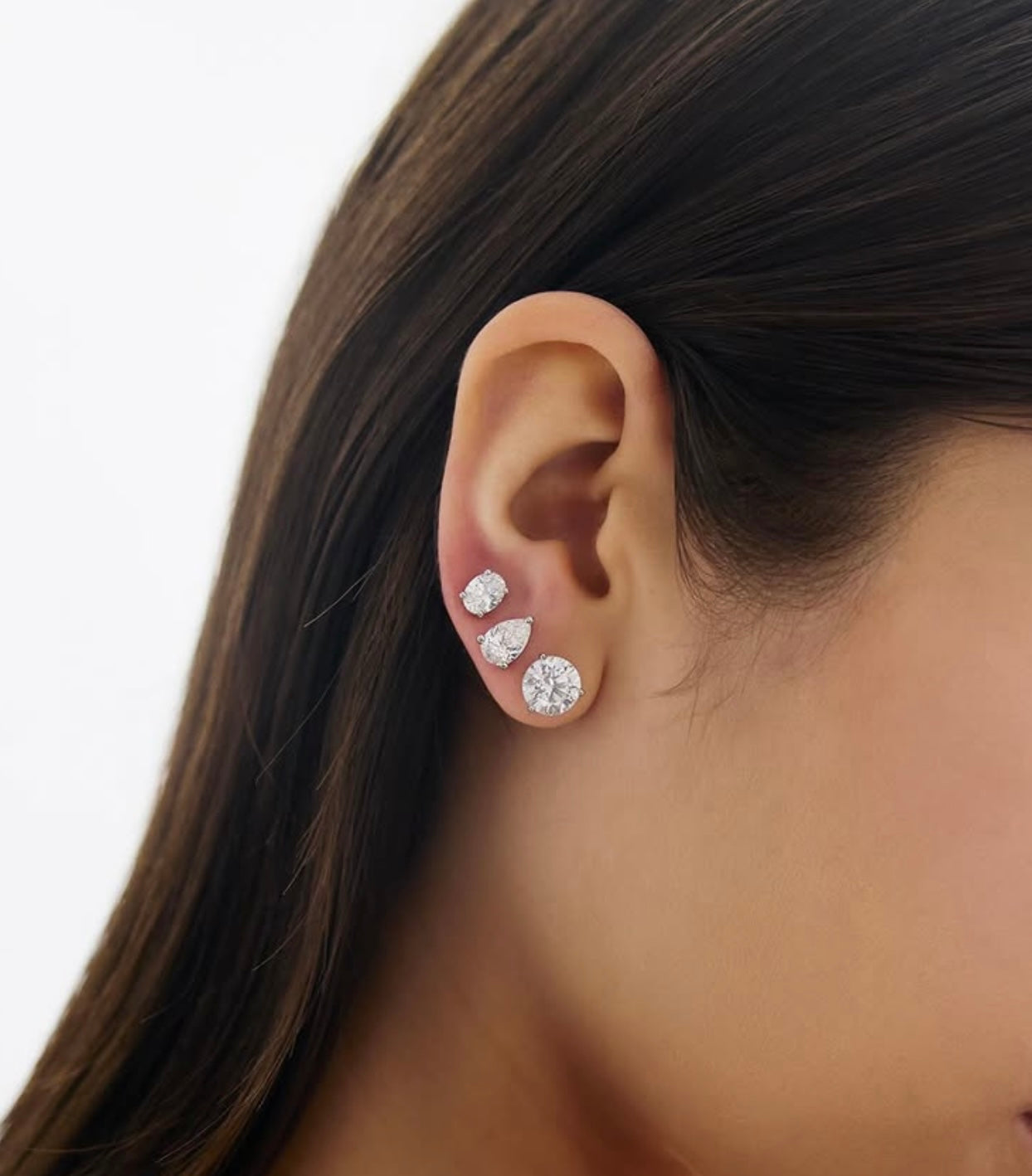 Round, pear and oval shaped lab diamonds in hallmark gold