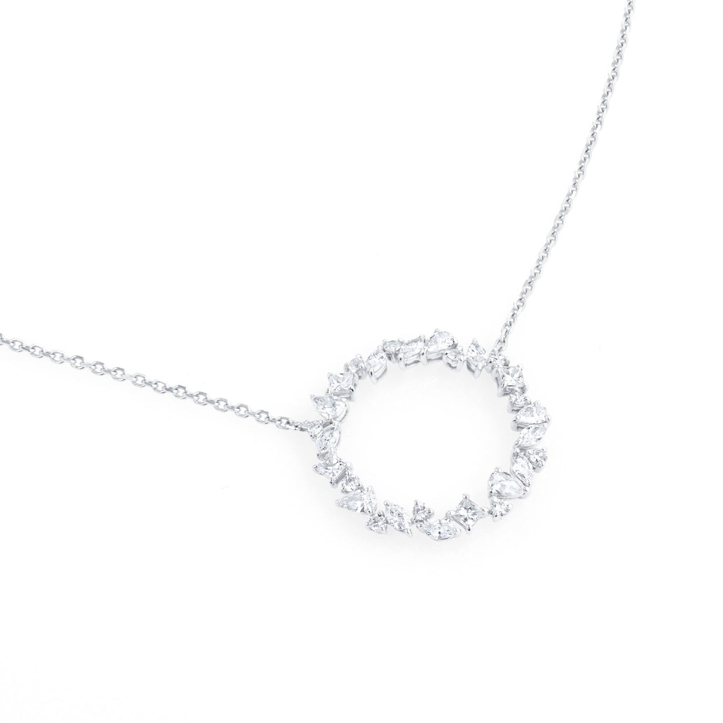 White gold chain with mixed shape lab diamond pendant in a circular pattern