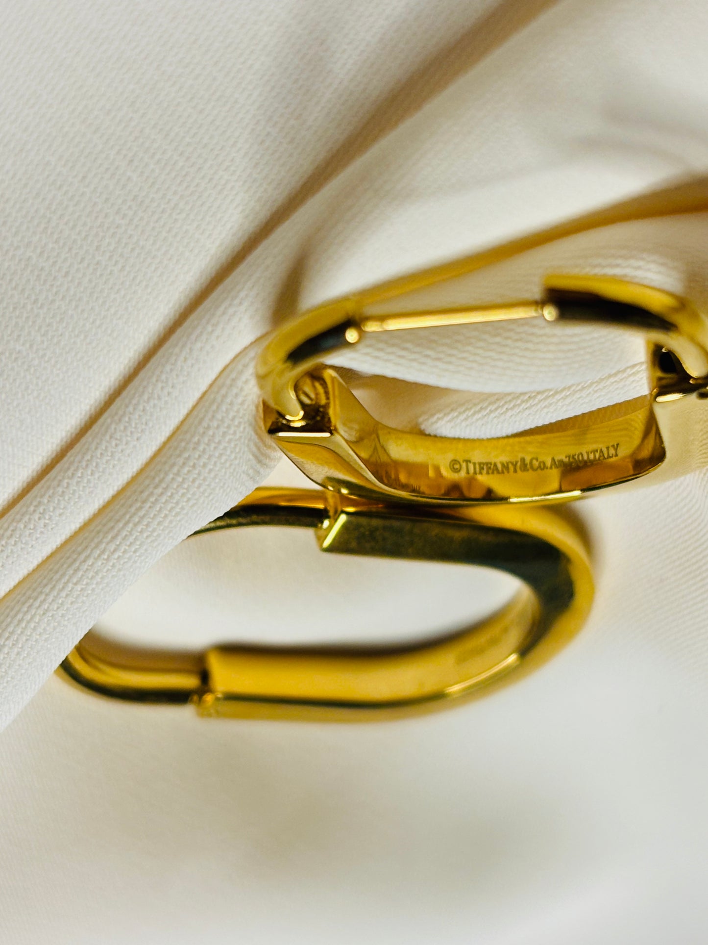 Gold tone hoop earrings made in 92.5 Sterling silver with 18kt gold plating