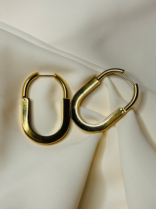 Oval hoop earrings made in 92.5 Sterling silver with 18kt gold plating