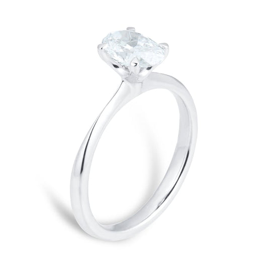 1 carat oval lab diamond solitaire ring in a 14kt white gold band. The ring is set in a classic 4 prong setting.