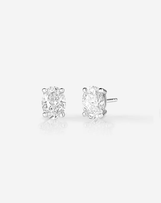 4ct Pair Oval Cut Lab Grown Diamonds Stud Earrings set in 14kt hallmark gold