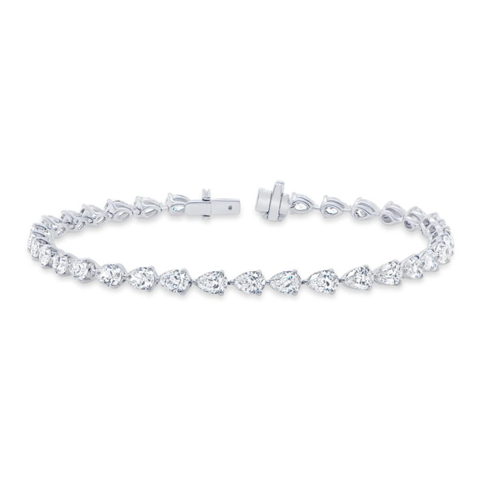 6.5 carat pear shape lab diamond tennis bracelet made in 14kt hallmark white gold with clasp closure