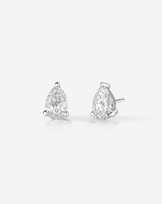 6CT Pair Pear Lab Diamond Stud Earrings in 14kt hallmark white gold. The studs show brilliant cut and clarity and are set with 3 white gold prongs. The studs are an embodiment of sustainable, ethical luxury accessory.