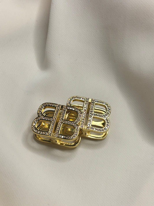 BB initial clip on earrings made in 92.5 sterling silver, and 18 karat gold plating