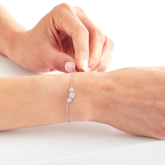 0.49 carat lab diamond dainty bracelet in a white gold chain on a hand