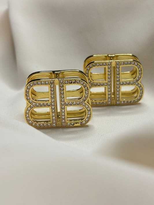 BB initial clip on earrings made in 92.5 sterling silver, and 18 karat gold plating