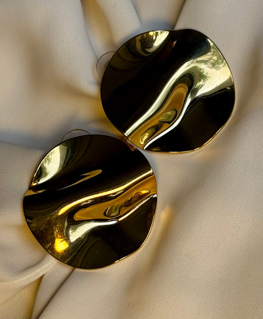 Disc statement studs made with 92.5 Sterling silver with 18kt gold plating.