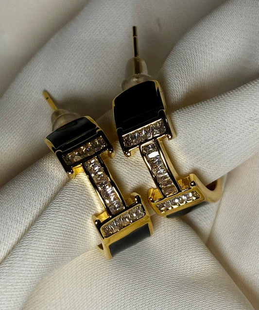 H initial hoops with moissanite stones made in Sterling silver with 18kt gold plating