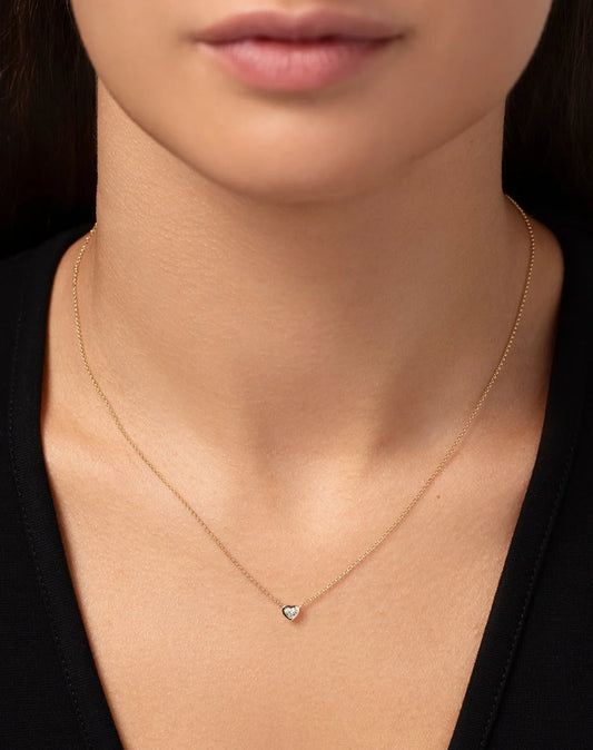 Half carat heart shape lab diamond pendant in a 9 karat hallmark yellow gold chain