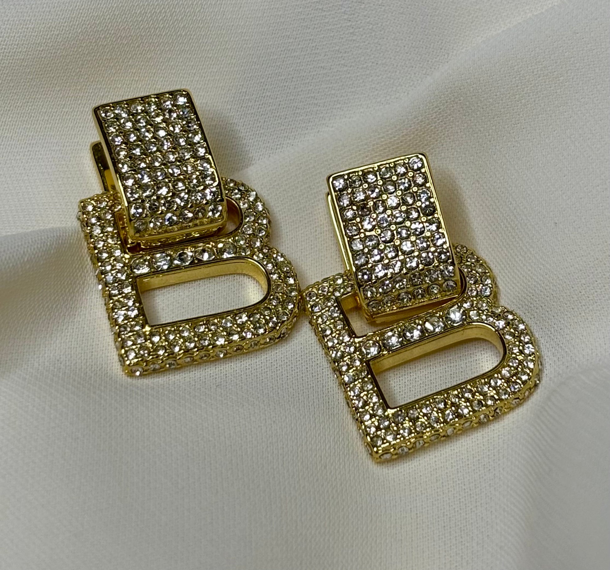 B initial clip on earrings made in 92.5 Sterling silver with 18kt gold plating and moissanite stones