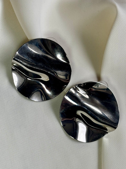 Statement disc earrings made with 92.5 sterling silver, and 18 carat white gold plating. Anti tarnish and waterproof.