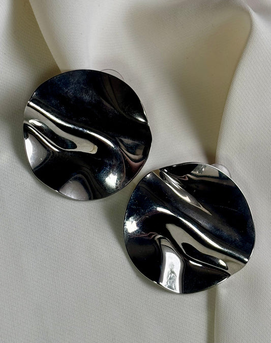 Statement disc silver tone earrings made with 92.5 sterling silver and 18 carat white gold plating. Anti Tarnish and waterproof.