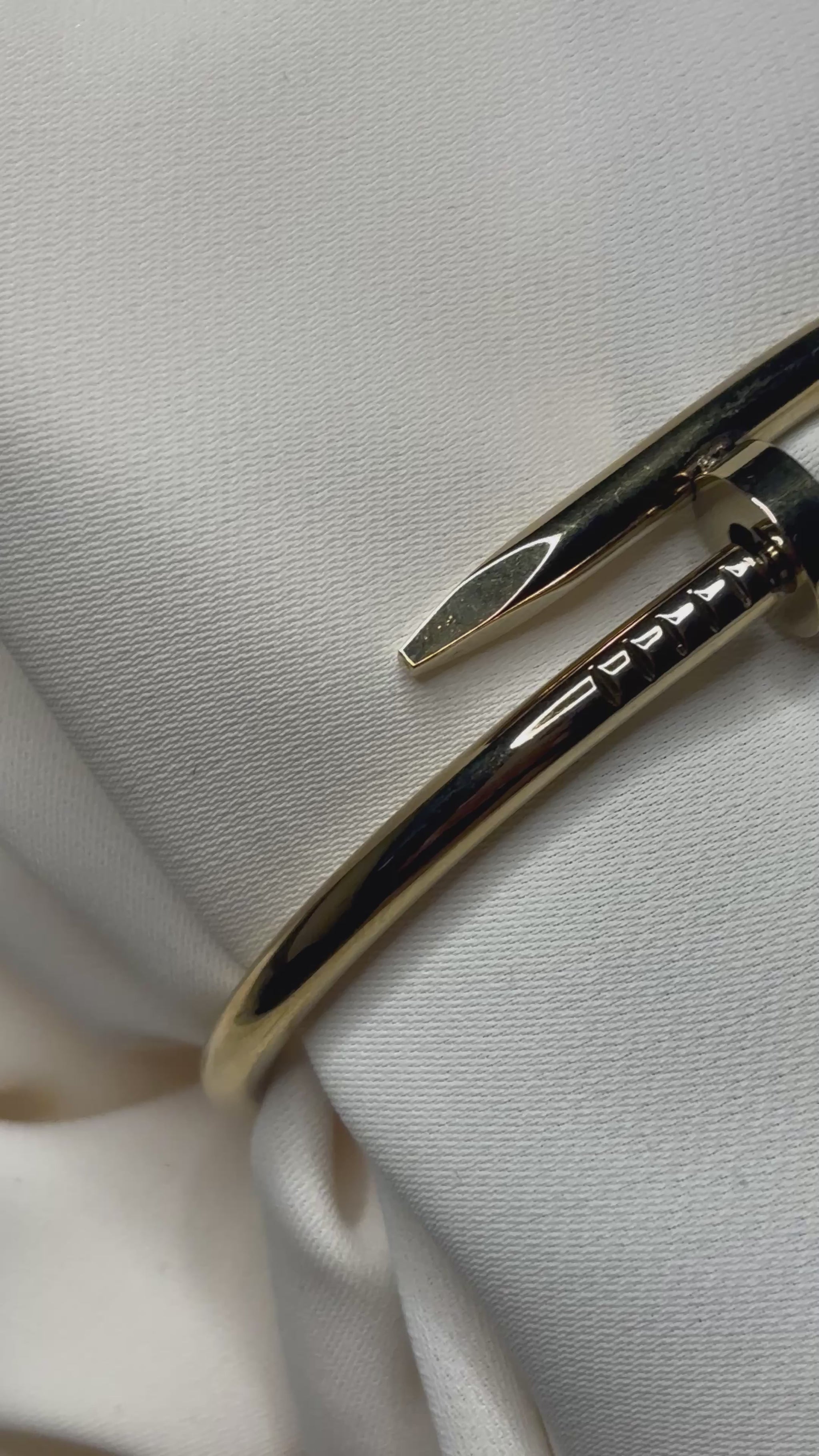 Nail design bracelet made with 92.5 sterling silver, and 18 karat gold plating. Anti- tarnish and waterproof.