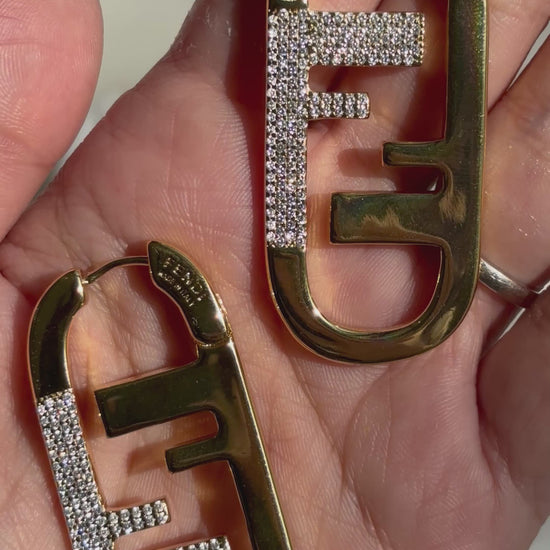 F initial gold tone hoop earrings made with Sterling silver and 18kt gold plating and moissanite stones